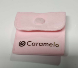 [18670] Bolsa joyero tipo monedero, color rosado. Caramelo
